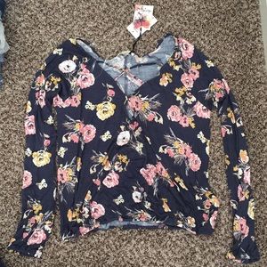 Long sleeve floral blouse.